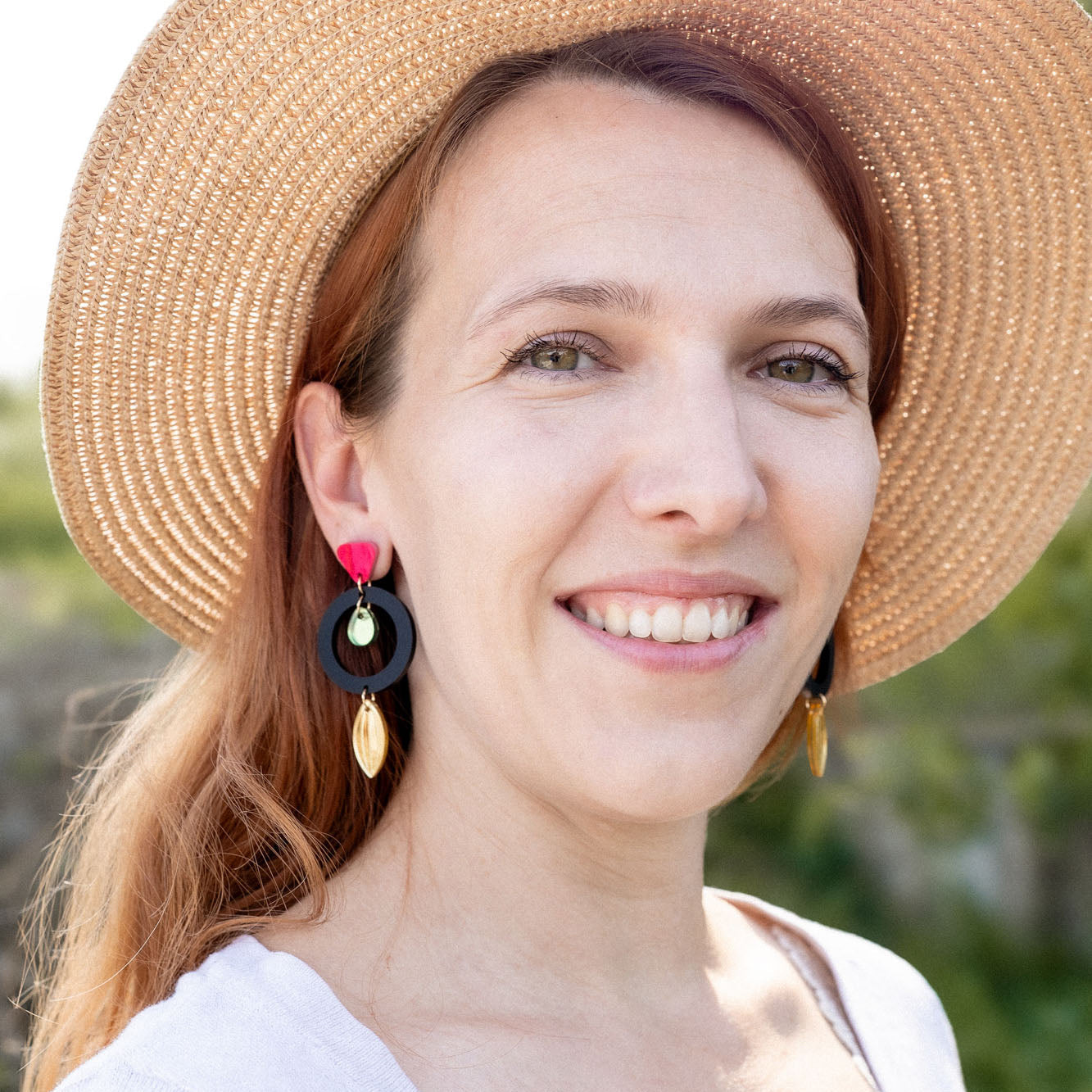 The Ultimate Guide to Dangle Earrings: Types, Styling, and Care